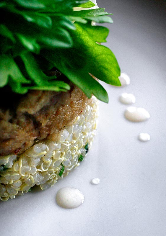 Pork belly confit, with quinoa, white grapefruit and flower honey at Beato in West Seattle. (Photographer: Andy Rogers)
