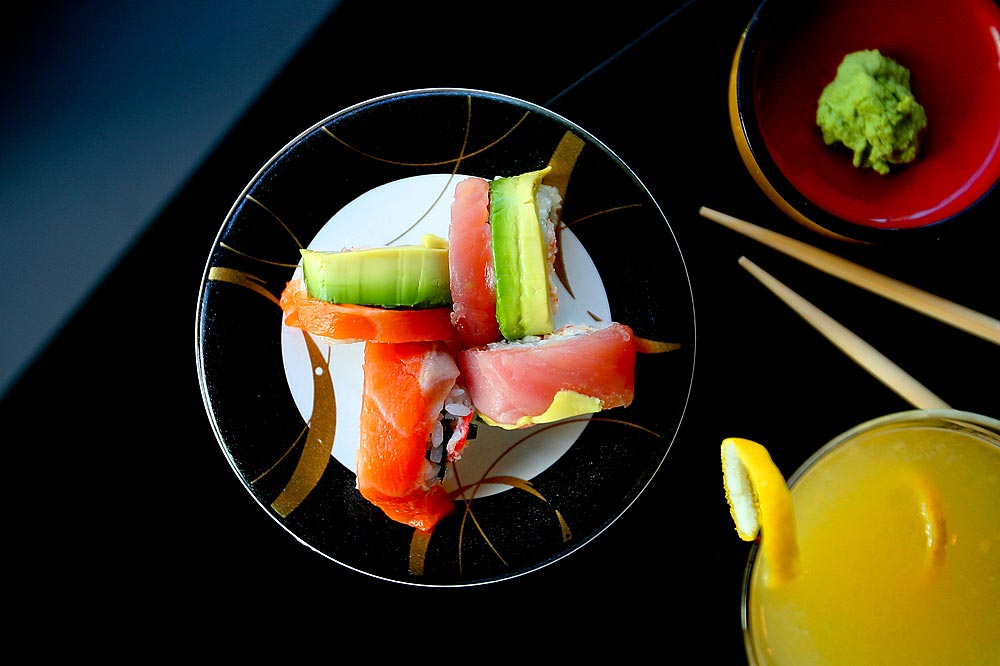 Rainbow roll of avocado, salmon and tuna with a Shanghai lemon drop at Genki Sushi in Seattle (Photographer: Scott Eklund)
