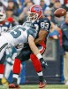 Seahawks safety Brian Russell drills Buffalo Bills wide receiver Lee Evans, causing an incomplete pass. (Photorapher: Dan DeLong)